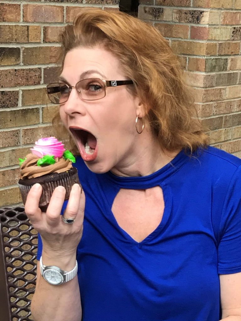 Kathryn eating chocolate cupcake
